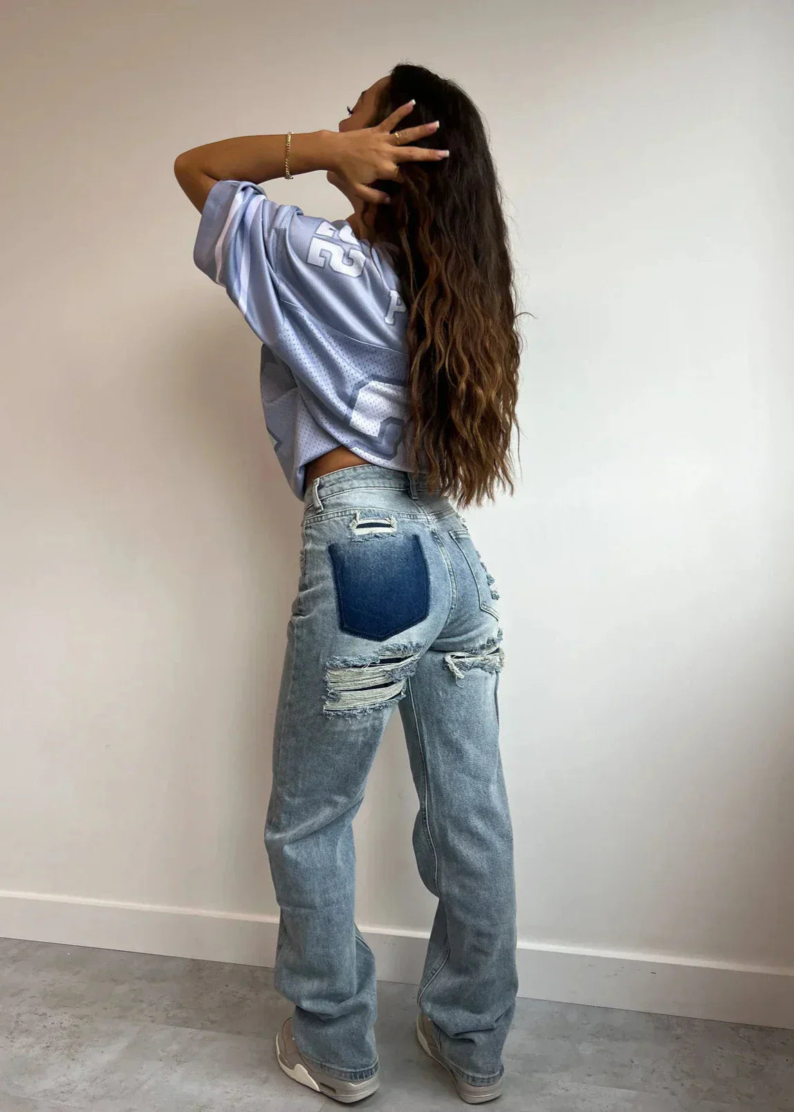 Vintage Women’s Jeans with High Waist and Ripped Details
