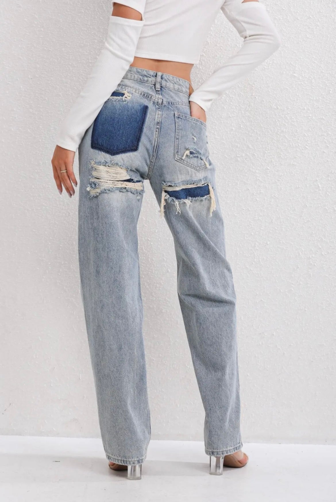Vintage Women’s Jeans with High Waist and Ripped Details