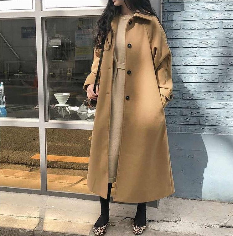 Elegant Long Women’s Coat with Button Closure and Pockets