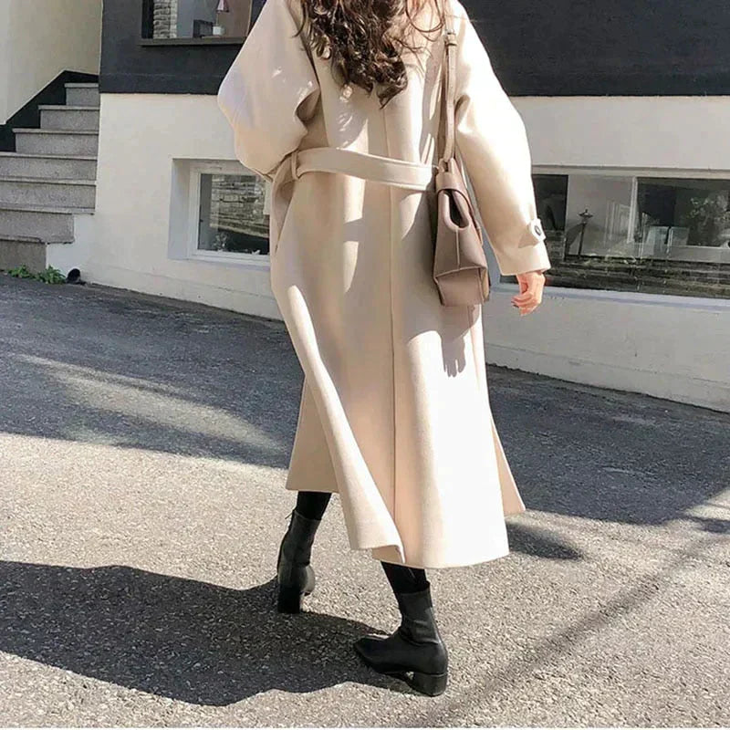 Elegant Long Women’s Coat with Button Closure and Pockets
