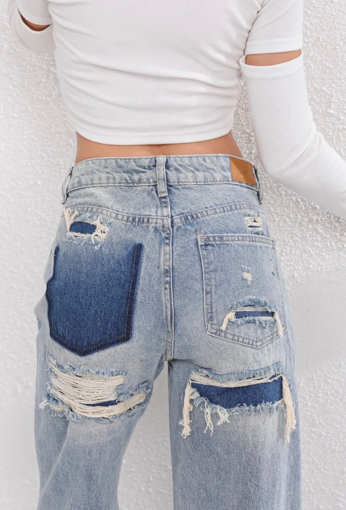 Vintage Women’s Jeans with High Waist and Ripped Details